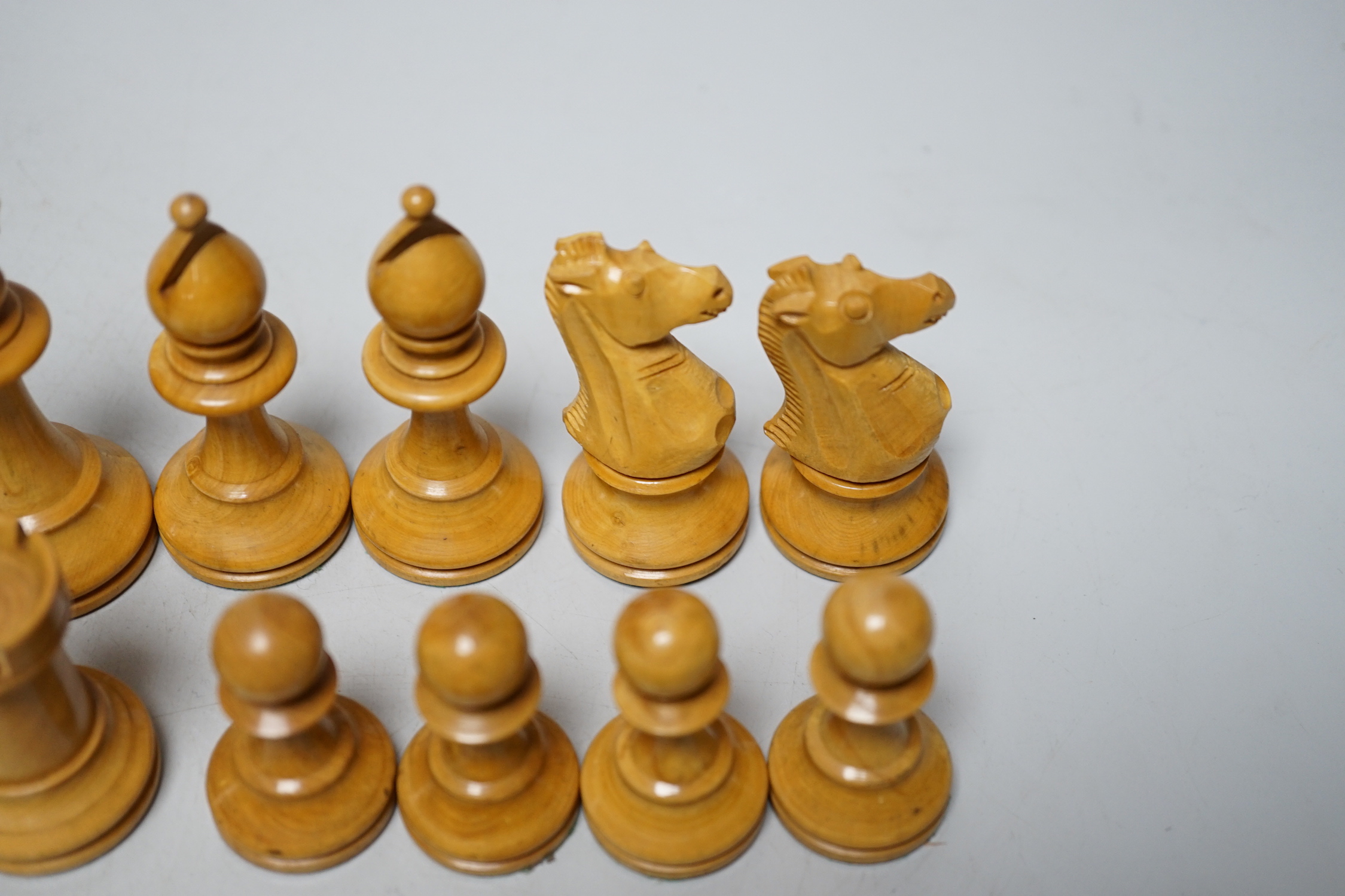 A Staunton pattern lead weighted part boxwood and ebony chess set, kings 8.3cm high (incomplete, lacking both black knights)